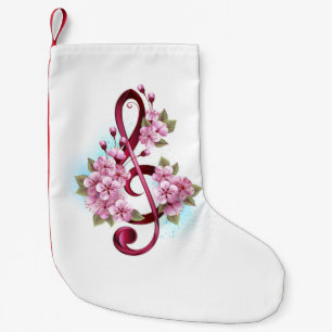 Muzieknotatie in vioolsleutel met Sakura bloemen Kleine Kerstsok