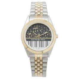 Muzieknoten en pianoketoetsen, zwart en goud horloge