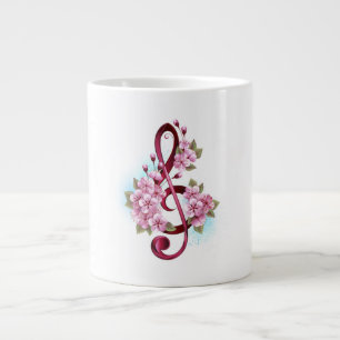 Muzieknoten in de sopraanklef met Sakura bloemen Grote Koffiekop