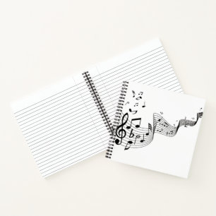 Muzieknoten op wit  notitieboek