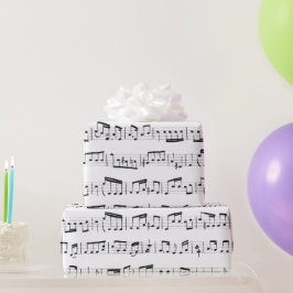 Muzieknoten over wit cadeaupapier