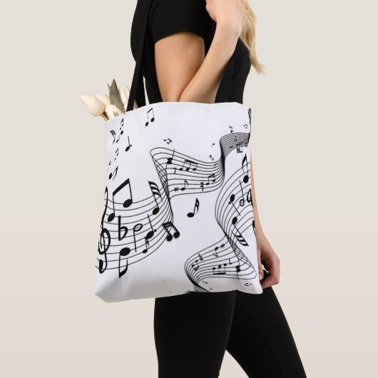 Muzieknoten over wit tote bag (Dichtbij)