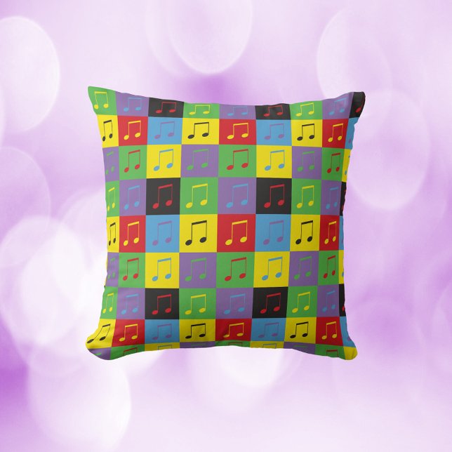 Muzieknoten Pop Art Pattern Kussen (A throw pillow with a pop art music note pattern)