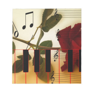 Muzieknoten rode rozenroze bloesem notitieblok