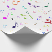 Muzieksymbolen in regenboogkleuren cadeaupapier (Hoek)