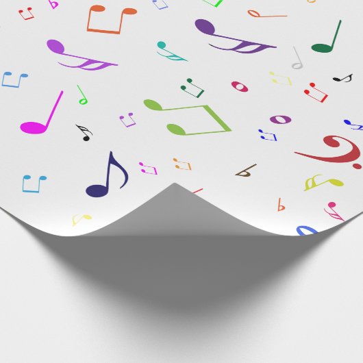 Muzieksymbolen in regenboogkleuren cadeaupapier (Hoek)