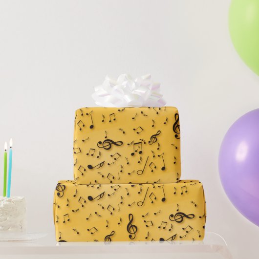 Muzieksymbolen op goud cadeaupapier (Feestgeschenken)