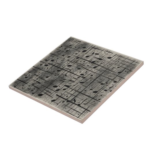 Muzikale noten op donkere houtskooltextuur tegeltje (Zijkant)