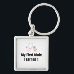 My First Clinic Keychain – I Earned It – Proud Fir<br><div class="desc">Celebrate the pride of owning your very first clinic! This keychain features the bold phrase "My First Clinic – I Earned It", perfect for anyone who worked hard to achieve this milestone. Whether it’s your first medical practice, dental office, or clinic space, this keychain is a fun and meaningful reminder...</div>