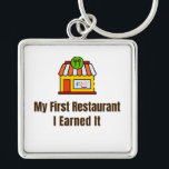 My First Restaurant Keychain β I Earned It β Proud<br><div class="desc">Celebrate the pride of opening your very first restaurant! This keychain features the bold phrase "My First Restaurant β I Earned It", perfect for anyone who worked hard to achieve this milestone. Whether itβs a diner, cafΓ©, or full-service restaurant, this keychain is a fun and meaningful reminder of dedication and...</div>