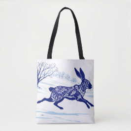 Mystieke haas: grillige haas in de sneeuw tote bag