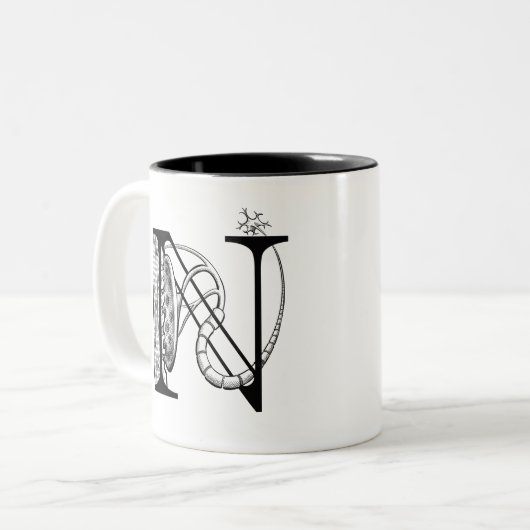 N is voor neuromusculaire verbinding (mok) tweekleurige koffiemok (Voorkant links)