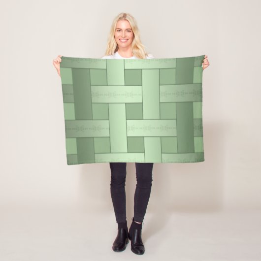Naadloos groen met zijden bekleed gestript patroon fleece deken (In situ)