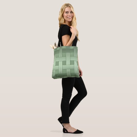Naadloos groen met zijden bekleed gestript patroon tote bag (Op model)