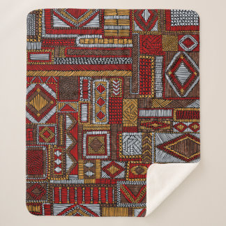 Naadloos patroon in patchwork-stijl. geborduurd E Sherpa Deken