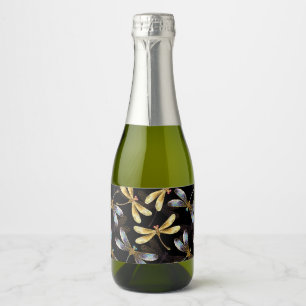 Naadloos patroon met gouden libellen sparkling wijnetiket