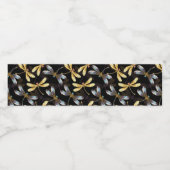 Naadloos patroon met gouden libellen waterfles etiket (Enkel label)