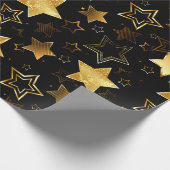 Naadloos patroon met gouden sterren cadeaupapier (Hoek)