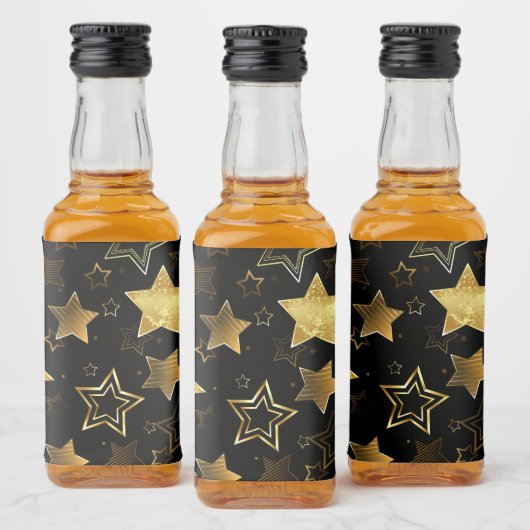 Naadloos patroon met gouden sterren likeurfles etiket (Flessen)