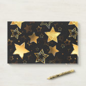 Naadloos patroon met gouden sterren post-it® notes (Op bureau)