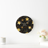 Naadloos patroon met gouden sterren ronde klok (Huis)