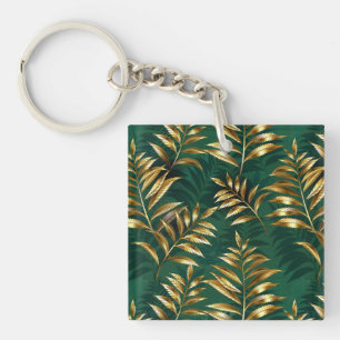 Naadloos patroon met gouden varens sleutelhanger
