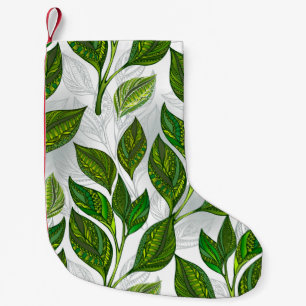 Naadloos patroon met groene theebladeren kleine kerstsok