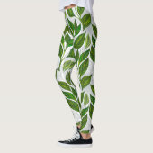 Naadloos patroon met groene theelbladeren leggings (Links)