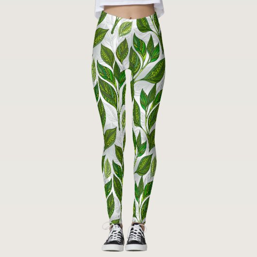 Naadloos patroon met groene theelbladeren leggings (Voorkant)