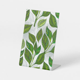 Naadloos patroon met groene theelbladeren reclamebord met voetstuk