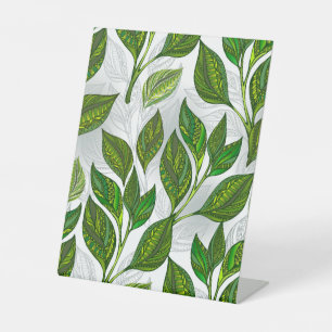 Naadloos patroon met groene theelbladeren reclamebord met voetstuk