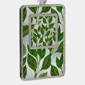 Naadloos patroon met groene theelbladeren verzilverd omlijst ornament (Rechts)