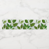 Naadloos patroon met groene theelbladeren waterfles etiket (Enkel label)
