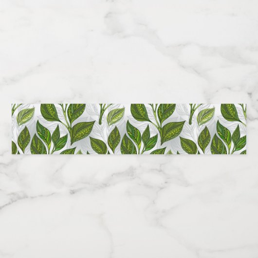 Naadloos patroon met groene theelbladeren waterfles etiket (Enkel label)