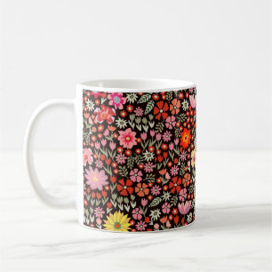 Naadloos patroon met zonnebloemen asters tulpen koffiemok
