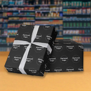 Naadloos patroon van bedrijfslogo op zwart cadeaupapier