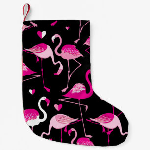 Naadloos patroon van roze flamingos op een donkere kleine kerstsok