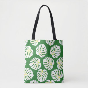 Naadloos patroon van wit monstera-bladeren op een  tote bag