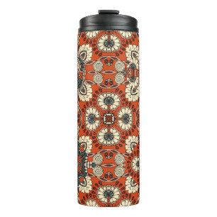 Naadloos sierpatroon met florale en paisle thermosbeker
