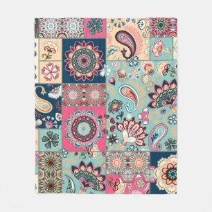 Naadloze patchwork-achtergrond met paisley en grie fleece deken