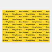 Naadloze prettige kerstteksten over geel inpakpapier vel (Voorkant)