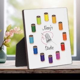 Naaigronden, naalden en draden fotoplaat