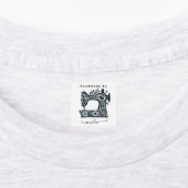 Naaimachineontwerp stof kleding met eigen naam labels (Aangebracht)