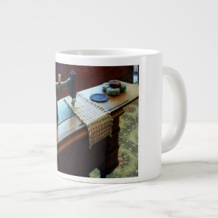naaimachines en snijmachines grote koffiekop