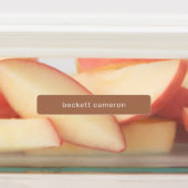 Naam op bruine kleefstof labels