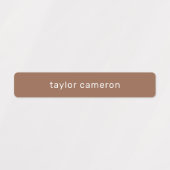 Naam op bruine kleefstof labels