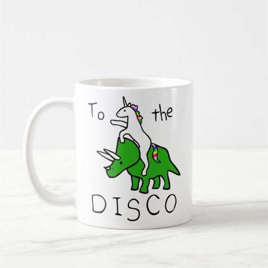 Naar de Disco (Unicorn Riding Triceratops) Koffiemok (Links)