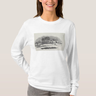 Naderen van een dorp in de winter t-shirt