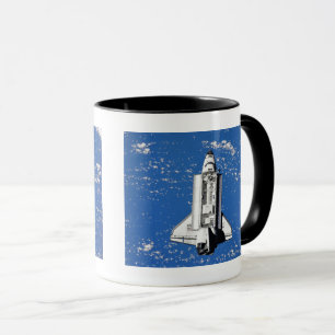 NASA Space Shuttle Discovery in de baan om de aard Mok