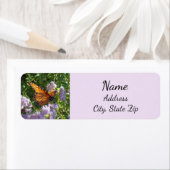 Natuur paarse bloemen met monboogvlinder etiket (Insitu)